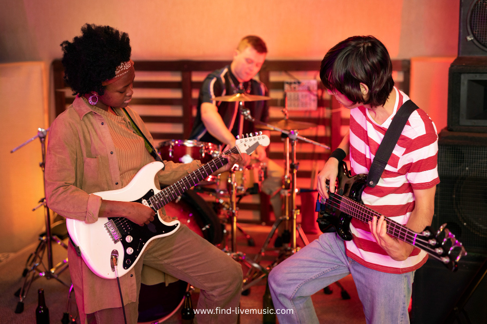A group of musicians playing various instruments together in a lively room setting